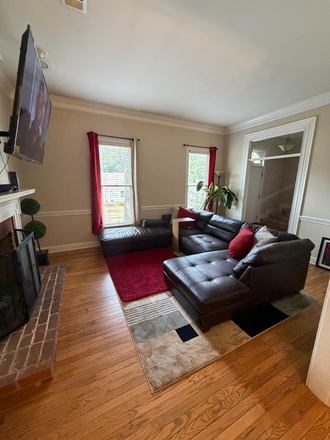 Living Room 2 - Executive Master Suite with Private Entrance in Belhaven Near Several Medical Facilities Townhome