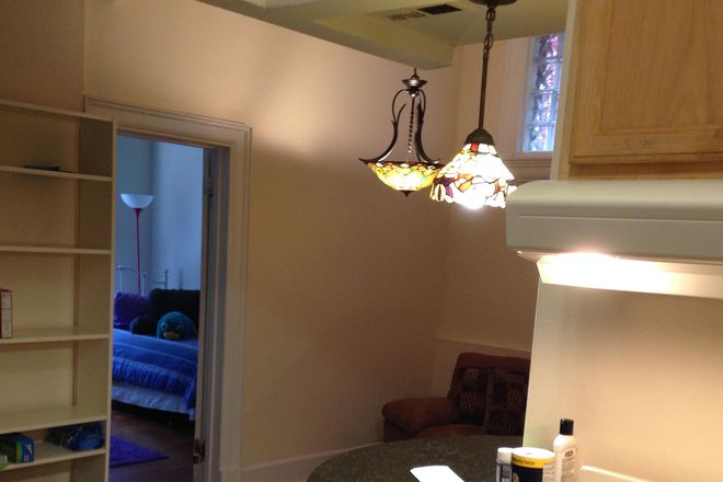 Granite half-moon granite bar counter - 1105 W Franklin St Apt # 2 - 2 BR & 2 Bath Colonial Elegance with Modern Amenities