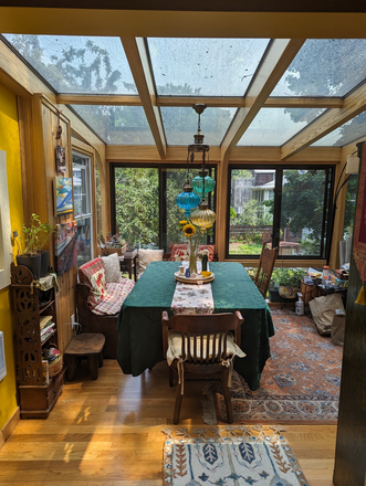Sunroom table - Warm & Cozy Condo Fully-furnished 2BR/1.5B Great Short-term Home