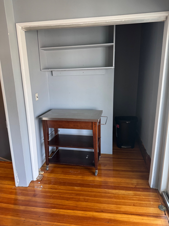 livingroom storage area - 2 family in the Tufts/Hillside area  This house respects and welcomes all walks of life