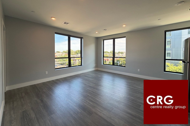 Living room - *NO BROKERS FEE!* Stunning 2 Bed/2Bath LAUNDRY IN UNIT! ROOF DECK! Apartments
