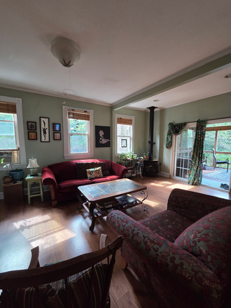 Living Room - Pet-Friendly 3 Bedroom Home: walkable neighborhood, 1 mile from Loyola University