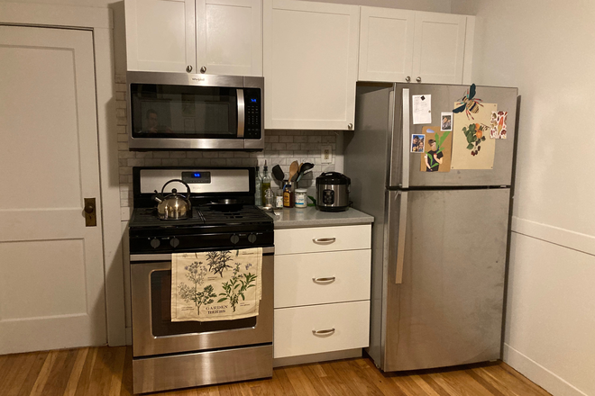 Kitchen - Fully furnished room near Red Line T stop ($1375) Duplex