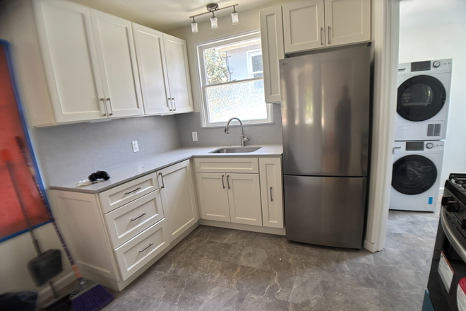 kitchen showing entrance to utility room - Newly refurbished 2 BR 1BA duplex in highly desired Berkeley neighborhood 15 min from campus