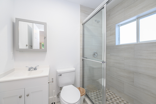 Bathroom 1 - Fully Remodeled House Minutes away from UM (3/3 with Shared Living Space)