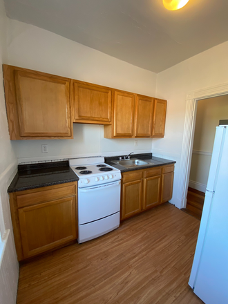 Visit hubrealtyproperties.com - Stately large one bedroom, with bay windows, Packards Corner Apartments