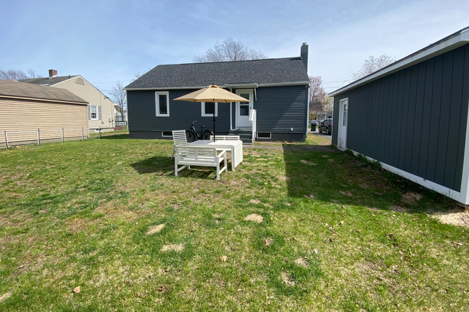 Backyard - Furnished 3BR Home (Configured as 2BR + Office) – Pets Allowed – Burlington