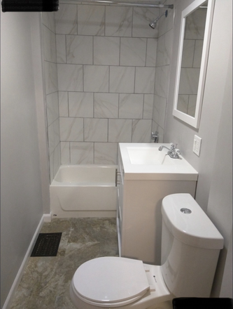 Bath - Modern home with an in-unit washer and dryer, located just 17 minutes from Tufts University.
