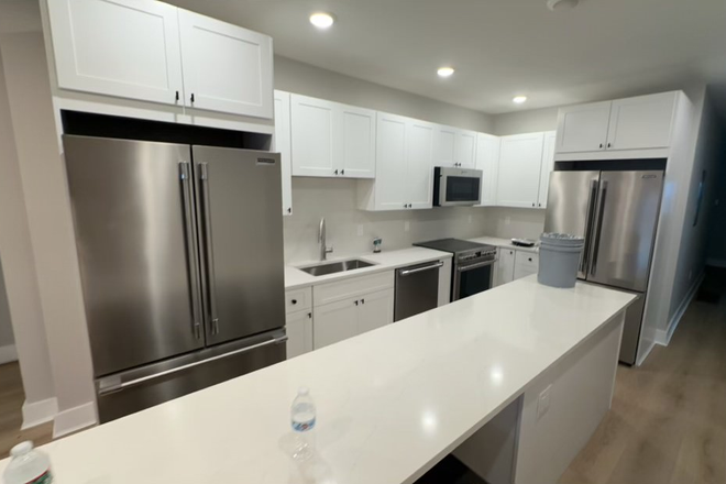 Kitchen - Available 9/1/25! Huge 8 Bed 3 Bath Apartment on Broadway! Perfect for Athlete Groups