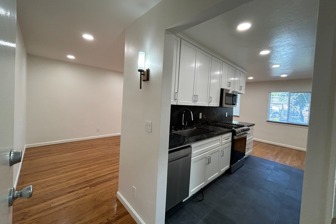 Kitchen from Entry - Spacious and  Light Filled, Wood Floors, One Mile to UC