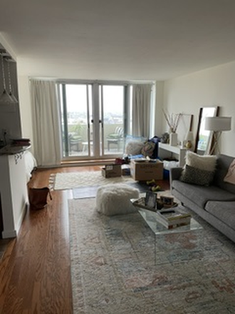 Living Room - Studio apartment with balcony overlooking Washington Square Park on 25th floor