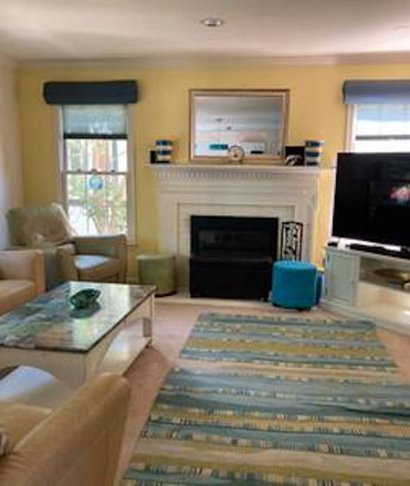 Shared living room with gas fireplace and TV - Bedroom Suite - Walkable to Campus & on UMD Shuttle Route House