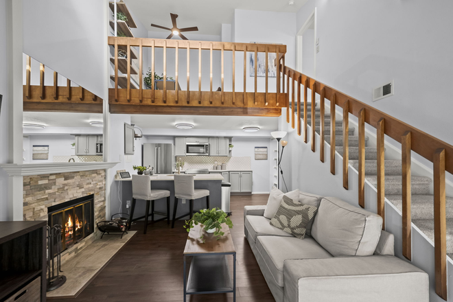 Living room, kitchen, and loft. - Newly renovated 2B/2BA condo!