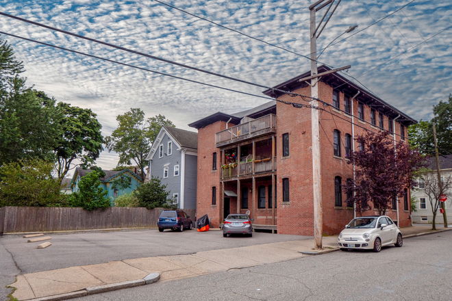 Parking lot - 2 bed/1 bath Historic building fully updated with AC, in unit laundry Apartments