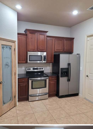 Kitchen on the first floor - Bedroom available in Wedgefield- 25 minutes from UCF and Valencia Townhome