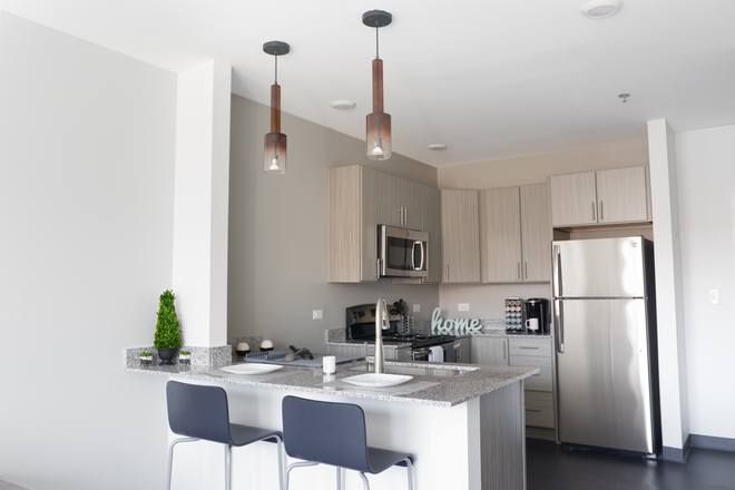 Altitude One Bedroom Kitchen & Bar - The Altitude Apartments