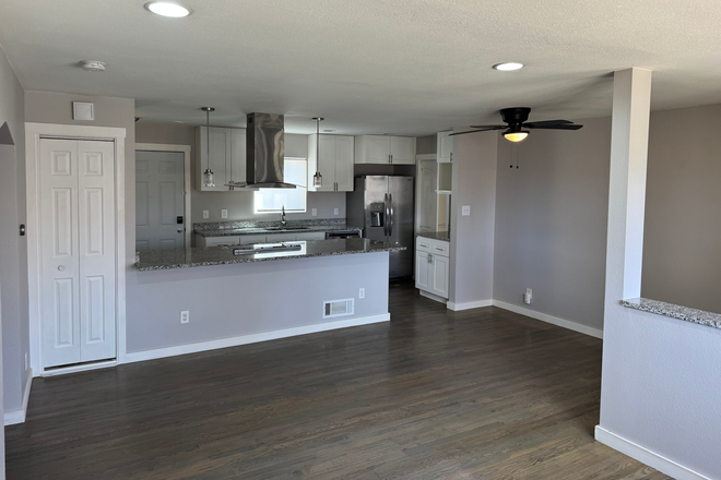 open kitchen and living room - Charming 3 Bed, 2 Bath w/ oversized garage and fenced in yard Aurora, CO - Available 5/1 - $2800 House