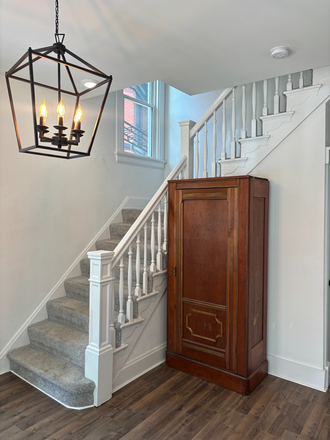 Front room looking at stairs to 2nd floor - Newly Renovated House Close to Campus