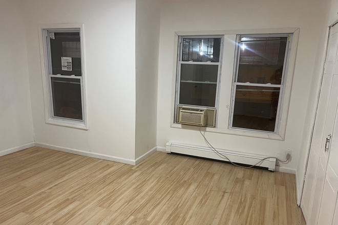 Bedroom facing street - Easy commute to Nyu from jersey city journal square Apartments