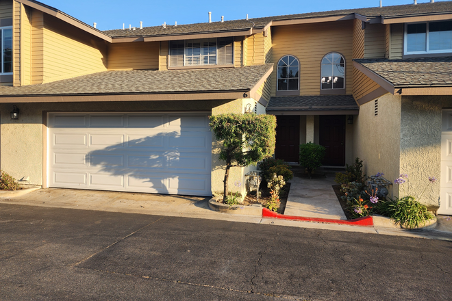 Unit with attached 2-car garage - Townhome very close to campus in gated community