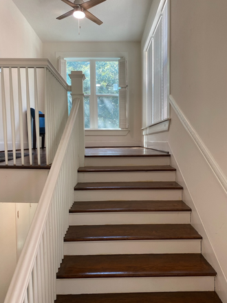 Stairway up view - Large two-bedroom house (duplex split); Short bike/walk to campus