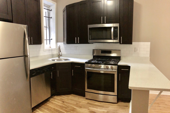 Kitchen - OCP - Updated 4 Bed 2 Bath With Private Patio In the Best Location Off Campus Apartments