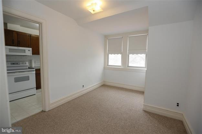 breakfast room with kitchen next to breakfast room. Room has large storage closet. - Merion Station Apartments