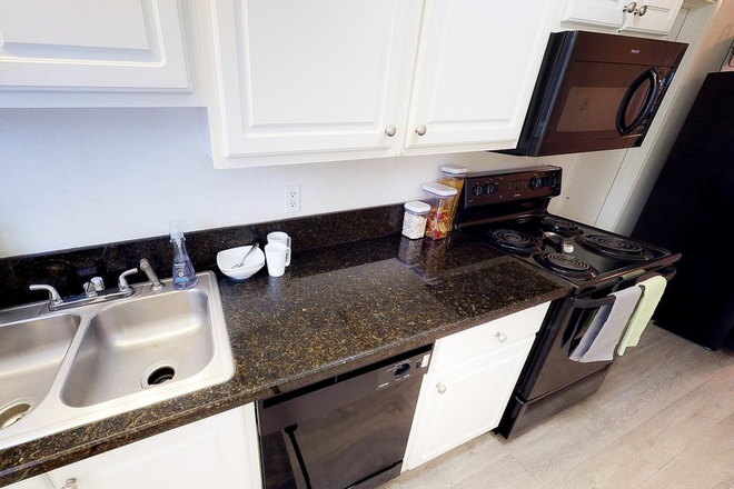 kitchen sink and cabinets - Capri Canterbury 2 bedroom apartment 2 blocks from campus