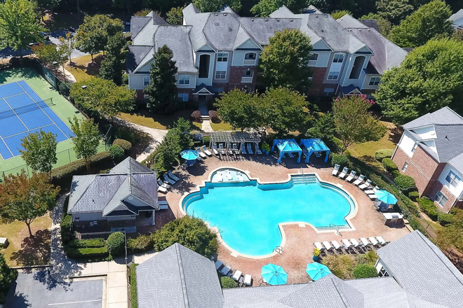 Drone shot of pool and tennis court - Hawthorne at Kennesaw Apartments