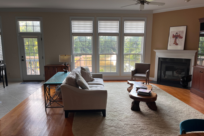 Living room - Beautiful furnished home with serene lake view.  3 bdrm 2.5 bath w/ dedicated office-South point