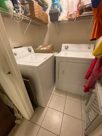 Laundry room - The Polos of Gainesville Apartments