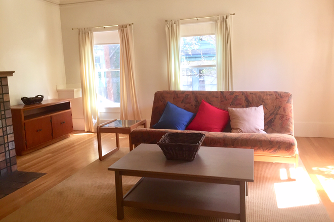 Living Room - Fully Furnished Very Large Quiet Sunny on Garden in Berkeley's Elmwood 1 Bdrm WALK to campus. Apartments