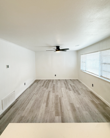 Living Room - Varsity Hill Apartments - 2 blocks from campus! PRE LEASING FOR 2025-2026