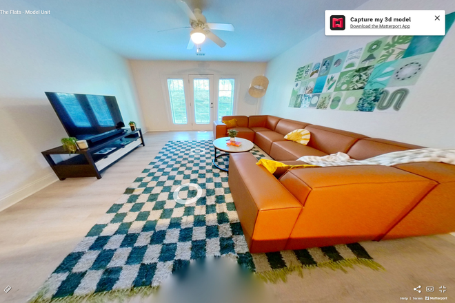 Living/Patio - The Flats at The Pier Apartments