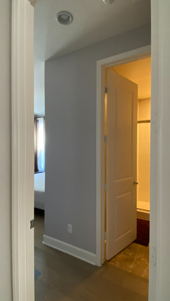 entrance to bedroom and private bathroom - A 1st floor guest room with private bath of a single-family house on a quiet and beautiful street.