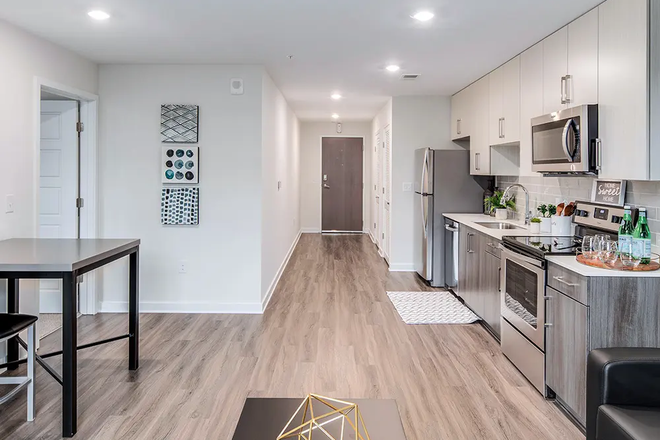 This photo is a sample of the living room in a B1 unit. - The Mix Student Residences Apartments