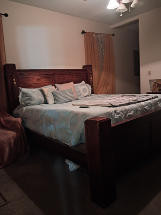 Master bedroom - Great location! Near campus, downtown and walking trail. House