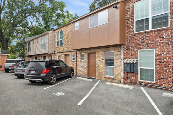 Parking spot by back entrance. - 2BR/1.5BA Townhome in Museum District