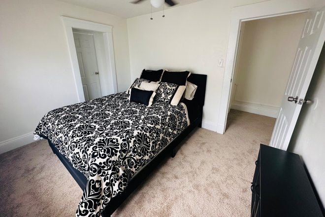 Room 2- queen bedroom - Big Blue 4 bed, 2 bath, furnished house. Utilities included