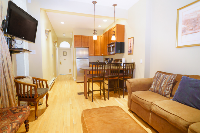 Living Room - Newly Renovated 2-Bedroom Next to Campus Available 9/1/25!!!! Apartments