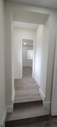 Hallway to bedroom with plenty of natural light and windows... - New efficiency near UM & Metro w/Large Bedroom/Private Bathroom & Kitchen - (Utilities in House