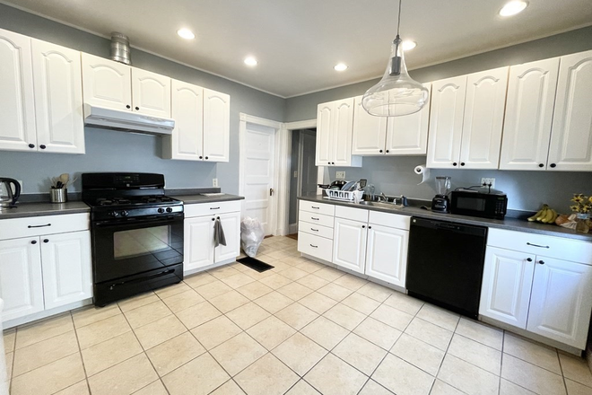 LIVING - SPACIOUS 4 BED/2 BATH AVAIL. 9/1/25!