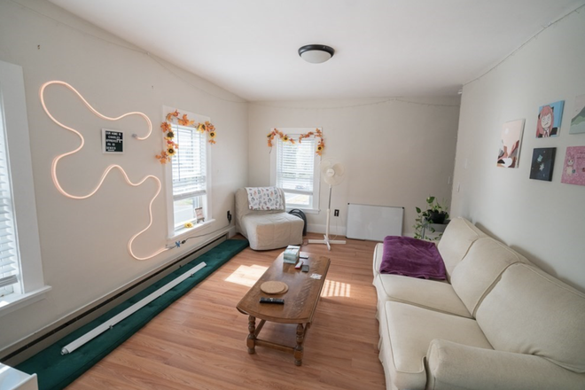 Living room - 3 bedroom and five bedroom available June 1 2026 !  Close to UMass Campus Apartments