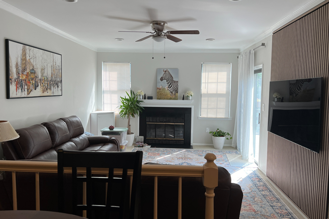 Living Room with fireplace and slider to deck - 3BR thome with garage-Manor Dr-Princeton