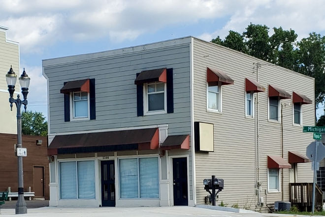 Street view. - Charming Downtown Lansing Apartment Near LCC & MSU, Bright, Full of Character, and On the #1