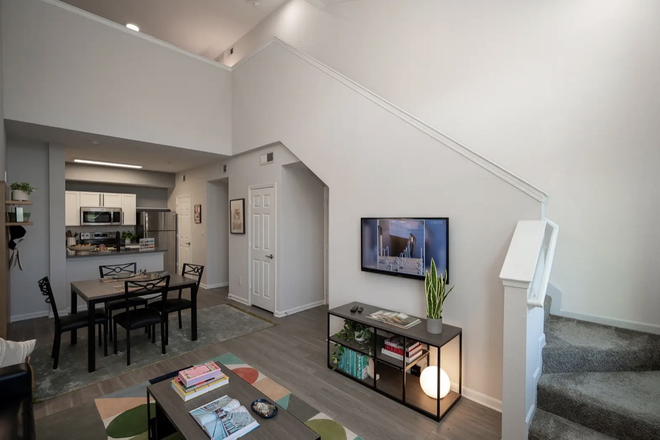 Living room - The Lofts 4x4 $999 and First month is on me!