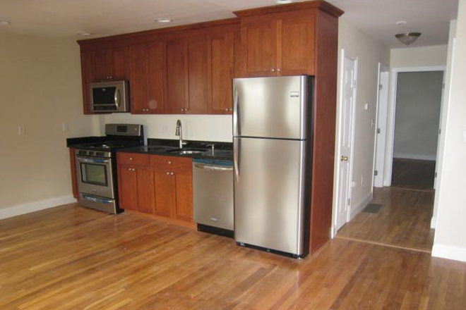 Visit hubrealtyproperties.com - Jamaica Plain, newly renovated spacious 2 bedroom 2 bathroom near Heath Street T Apartments