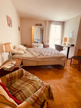 Master bedroom fully furnished with queen-size bed, easy chair, adjustable desk - Charming Fully Furnished Master Bedroom with own Bathroom and Shower Condo