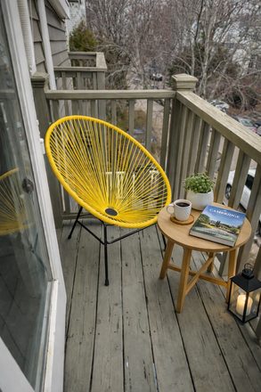 balcony with direct access from main bedroom - Furnished 2BR | West Cambridge/Fresh Pond | Easy Harvard Access | All-Inclusive | Pet-Friendly Townhome