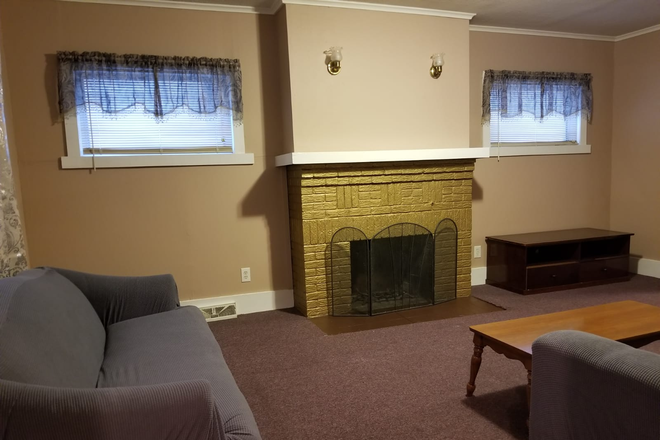 Livingroom - Large 3 bedroom with or without furniture, off St. parking Laundry Rental